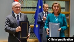 Belgium - EU foreign policy chief Federica Mogherini and Armenian Foreign Minister Edward Nalbandian sign the Armenia-EU Comprehensive and Enhanced Partnership Agreement in Brussels, 24Nov2017. 