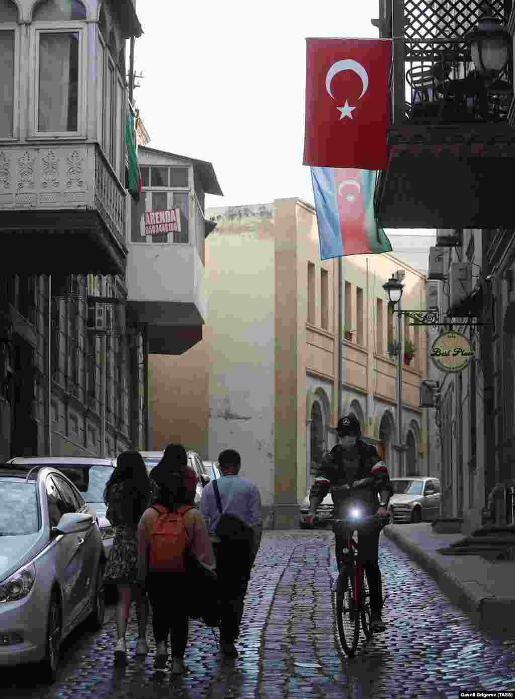 Turkish and Azerbaijani flags hang over the street in central Baku on October 23. Turkey and Azerbaijan share strong cultural and historical ties. 