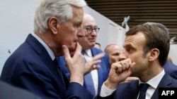 Прэм'ер-міністар Францыі Мішэль Барнье і прэзыдэнт Эманюэль Макрон.