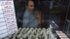 Lack Of Currency 'Halts' Iran Imports