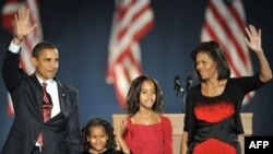 U.S. President-elect Barack Obama and family members appear on stage for his victory speech in Chicago.