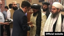 Taliban representatives meeting with Uzbek officials in 2019