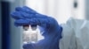 Explainer: Putin Says Russia Has A COVID-19 Vaccine. Doubts Abound.