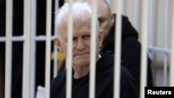 Ales Byalyatski attends a court hearing in Minsk last month.