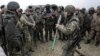 Бійці добровольчого батальйону «Донбас» під час військових навчань неподалік від Маріуполя. 1 квітня 2015 року