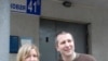 Vladimir Romanov (right) and his wife Margarita say police investigators extorted money from them.