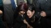 Kazakhstan - Asel Kopbosynova (R), wife and public defender of Almat Zhumagulov, after the sentence against her husband. Almaty, 21Dec2018.