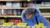 U.S. and EU sanctions over Moscow's interference in Ukraine have increased Russia's isolation, while the Kremlin's retaliatory ban has swept many Western foods off the shelves and driven inflation up.