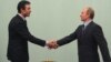 Андерс Фог Расмуссен сказал журналистам, что доволен трехдневным визитом в Москву (На фото: генеральный секретарь НАТО и премьер-министр России Владимир Путин)