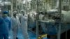 Iran Implements Nuclear Deal; EU Curbs Sanctions