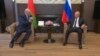 Belarusian President Alyaksandr Lukashenka meets with Russian President Vladimir Putin in the Black Sea resort of Sochi on September 14. 