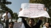 Rohani Returns To Mixed Welcome After Historic Chat With Obama